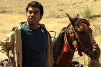 سروش صحت در نمایی از فیلم « عاشق ها ایستاده میمیرند»