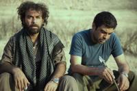 شوان عطوف و سروش صحت در نمایی از فیلم « عاشق ها ایستاده می میرند»